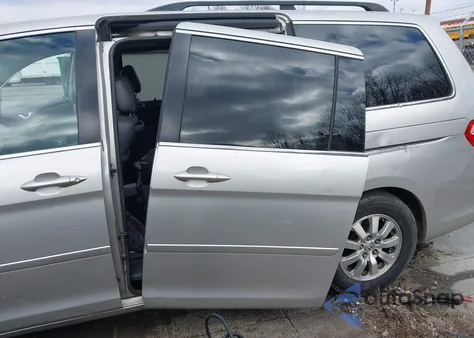 2005 Honda Odyssey Touring z USA, uszkodzony, nr VIN 5FNRL388X5B131696